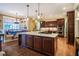 Well-equipped kitchen featuring a large central island with marble countertop and modern appliances at 403 Granville Rd, Chapel Hill, NC 27514