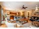 Open-concept living room connected to kitchen, featuring comfortable seating and fireplace at 403 Granville Rd, Chapel Hill, NC 27514