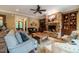 Inviting living room with stone fireplace, comfortable seating, and warm decor at 403 Granville Rd, Chapel Hill, NC 27514