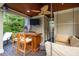 Cozy cabana boasts a mounted TV, wet bar, comfortable seating, and inviting ambiance at 403 Granville Rd, Chapel Hill, NC 27514