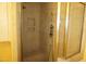 Walk-in shower with a built-in seat and sleek showerhead at 4113 Oak Park Rd, Raleigh, NC 27612