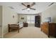 Bedroom featuring a single bed, hardwood furniture, and large window at 420 Marsh Landing Dr, Holly Springs, NC 27540