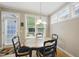 Breakfast nook featuring bright light, hardwood floors, and a view to the outside at 420 Marsh Landing Dr, Holly Springs, NC 27540