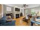 Inviting living room featuring hardwood floors, a fireplace and cozy furniture at 420 Marsh Landing Dr, Holly Springs, NC 27540