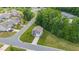 Charming home featuring pristine landscaping and a verdant lawn, nestled on a tranquil street at 4221 Northrop Dr, Haw River, NC 27258