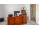 Cozy office space with a wood desk and ample storage, perfect for a home-based professional at 4221 Northrop Dr, Haw River, NC 27258