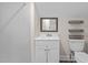 Small bathroom featuring a white vanity with a sink and open shelving at 4309 Birmingham Way, Raleigh, NC 27604
