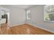 Bedroom featuring hardwood floors, neutral walls and windows at 4309 Birmingham Way, Raleigh, NC 27604