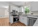 Bright kitchen featuring stainless steel appliances and updated finishes at 4309 Birmingham Way, Raleigh, NC 27604