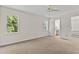 Carpeted main bedroom with attached bathroom and walk-in closet at 4309 Birmingham Way, Raleigh, NC 27604