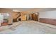 Unfinished basement featuring concrete flooring and stairs to the main level at 502 Hiddenbrook Dr, Durham, NC 27703
