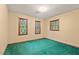 Bright bedroom featuring natural light and green carpet at 502 Hiddenbrook Dr, Durham, NC 27703