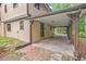 Attached carport provides covered parking and easy access to the home's entrance at 502 Hiddenbrook Dr, Durham, NC 27703