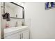 Well-lit bathroom with a modern vanity and white tile backsplash at 510 N Waters Edge Dr, Durham, NC 27703
