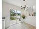 Sunny breakfast nook with sliding glass doors leading to the backyard at 510 N Waters Edge Dr, Durham, NC 27703