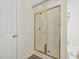 Modern shower with gold trim and glass doors at 510 N Waters Edge Dr, Durham, NC 27703