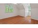 Spacious bedroom featuring a vaulted ceiling, a large window and hardwood floors at 524 Preston Andrews Rd, Bahama, NC 27503