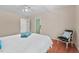 Bright bedroom with hardwood floors, a comfortable seating area, and private access to the outdoors at 524 Preston Andrews Rd, Bahama, NC 27503