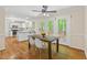 Bright dining area with hardwood floors and views of the backyard at 524 Preston Andrews Rd, Bahama, NC 27503
