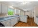 Open kitchen featuring lots of cabinets, stainless steel appliances, and natural lighting at 524 Preston Andrews Rd, Bahama, NC 27503