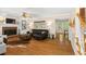 Cozy living room with fireplace, hardwood floors, and ample natural light at 524 Preston Andrews Rd, Bahama, NC 27503