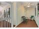 Inviting screened porch with rocking chairs and ample space for outdoor relaxation, offering a peaceful retreat at 524 Preston Andrews Rd, Bahama, NC 27503