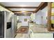 Well-appointed kitchen featuring granite countertops, stainless steel appliances, and ample cabinet space for storage at 5300 Whippoorwill St, Durham, NC 27704