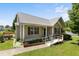 Charming one-story home features a ramp, manicured lawn, and inviting entrance at 55 Ayden Dr, Clayton, NC 27520