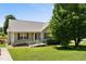 Charming single-story home with a ramp and inviting front yard with mature trees at 55 Ayden Dr, Clayton, NC 27520