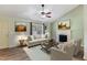 Inviting living room featuring a fireplace, neutral walls, and comfortable seating at 55 Ayden Dr, Clayton, NC 27520