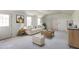 Living room featuring bright windows and a stylish sitting arrangement at 55 Ayden Dr, Clayton, NC 27520