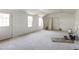 Bright, unfinished living room featuring ample natural light at 55 Ayden Dr, Clayton, NC 27520