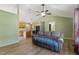Open-concept living room and kitchen with hardwood floors at 55 Ayden Dr, Clayton, NC 27520