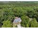 Aerial shot captures home surrounded by trees, showcasing a large backyard area at 556 Margaret Pl, Garner, NC 27529