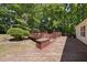 Spacious wooden deck perfect for outdoor dining and entertaining, surrounded by trees at 556 Margaret Pl, Garner, NC 27529