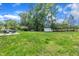 Spacious backyard featuring an outdoor patio with furniture and a shed, ideal for outdoor enjoyment at 5718 Woodcrest Dr, Raleigh, NC 27603