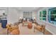 Bright living room with new furniture, stylish decor, and an open view to the kitchen at 5718 Woodcrest Dr, Raleigh, NC 27603