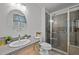 Bathroom featuring granite counter tops, a walk in shower, and a round mirror at 609 Chivalry Dr, Durham, NC 27703