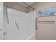 Bathroom featuring a walk-in shower with grab bars and a hand-held shower head at 609 Chivalry Dr, Durham, NC 27703