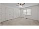 Bedroom with a ceiling fan, natural light, and closet space at 609 Chivalry Dr, Durham, NC 27703