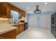Kitchen features stainless steel appliances, wooden cabinets, and plenty of counter space at 609 Chivalry Dr, Durham, NC 27703