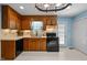 Bright kitchen features ample storage, updated appliances, and a neutral color palette at 609 Chivalry Dr, Durham, NC 27703