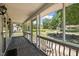 Screened in porch view overlooking the neighborhood street at 609 Chivalry Dr, Durham, NC 27703