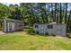 Two convenient storage sheds in the backyard, providing ample space for tools and equipment at 609 Chivalry Dr, Durham, NC 27703