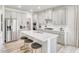 Modern kitchen featuring stainless steel appliances, white countertops, and ample cabinet space at 701 Deschutes Dr, Garner, NC 27529