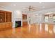 Bright and airy living room boasting hardwood floors, a fireplace with built-ins, and an open layout for versatile living at 716 Arbor Brook Dr, Cary, NC 27519