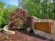 The stone entrance of Shinleaf Estates with decorative landscape features, and community signage at 7652 Falls Creek Ln, Raleigh, NC 27614