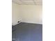 Basement space with concrete floors and white brick wall at 808 Belvedere St, Rocky Mount, NC 27803