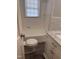 Bathroom with a bathtub, tile walls and floors, and a white vanity at 808 Belvedere St, Rocky Mount, NC 27803