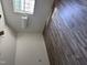 Bedroom featuring wood floors, a window, and modern lighting at 808 Belvedere St, Rocky Mount, NC 27803